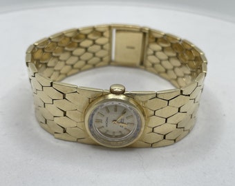 Ladies 14K gold bracelet watch