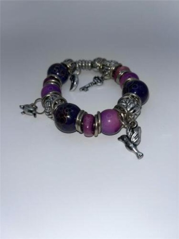 Purple and Silver-tone charm bracelet