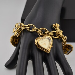Betsey  Johnson cheetah print heart watch s-l400.jpg main image 3