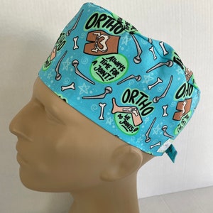 Men&#39;s Surgical Scrub Hat~with ties~Orthopedics~Ortho Surgery~Joint Replacement~Ortho does Joints~Bones~Fractures~Trauma