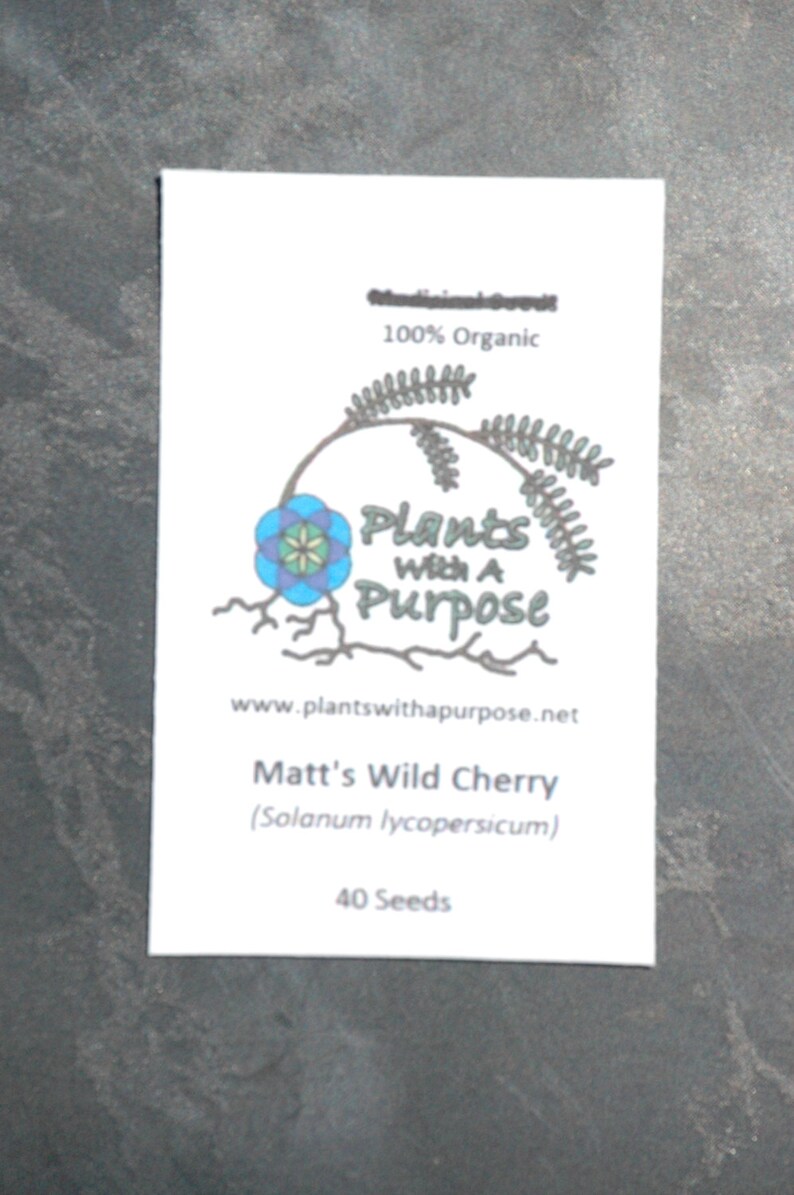 May include: A white seed packet with the text "Medicinal Seeds" and "100% Organic." The packet features a logo with a blue and green floral design and the words "Plants With A Purpose." It lists "Matt's Wild Cherry" and 40 seeds.