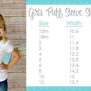 May include: A young girl wearing a white puff-sleeve shirt and blue jeans, with a large white bow in her hair. A chart on the right displays shirt measurements in inches for various sizes, labeled "Girls Puff Sleeve Shirt Chart."