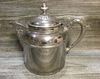 Beautiful vintage metal teapot , serving my pitcher