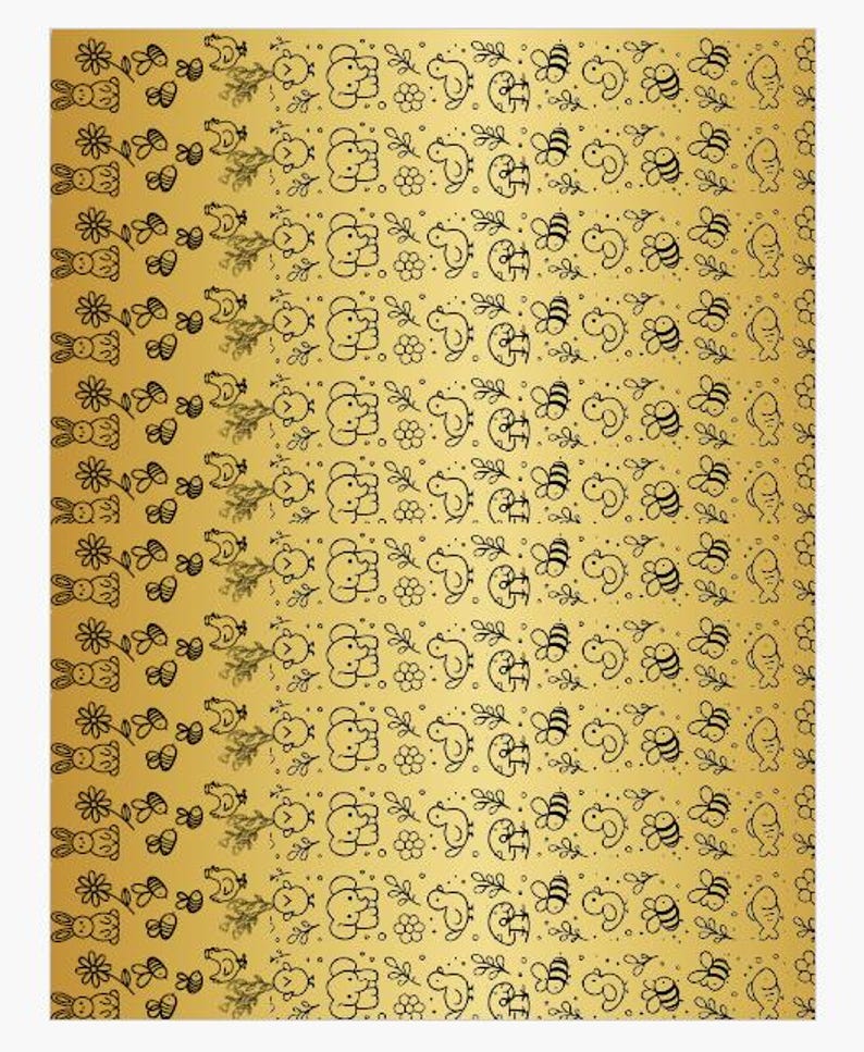 May include: A gold-colored sheet featuring a repeating pattern of black line art illustrations. The design includes rabbits, flowers, bees, chicks, elephants, ducks, and fish arranged in horizontal rows across the metallic surface.