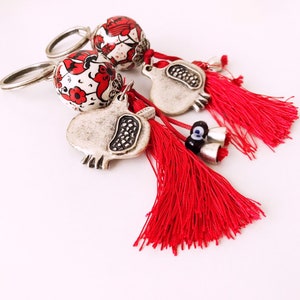 Evil eye keychain, pomegranate keychain, evil eye bag accessories, ceramic evil eye key chaim, red tassel keychain, silver pomegranate charm image 2