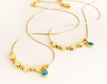 Vier blad klaver ketting, kwade oog ketting, minimalistische gouden ketting, blauw kwaad oog, geluk bedels, klaverblad sieraden, Griekse sieraden