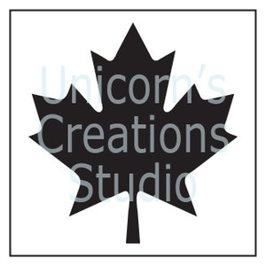May include: Black silhouette of a maple leaf. The text "Unicorn's Creations Studio" is superimposed over the leaf.