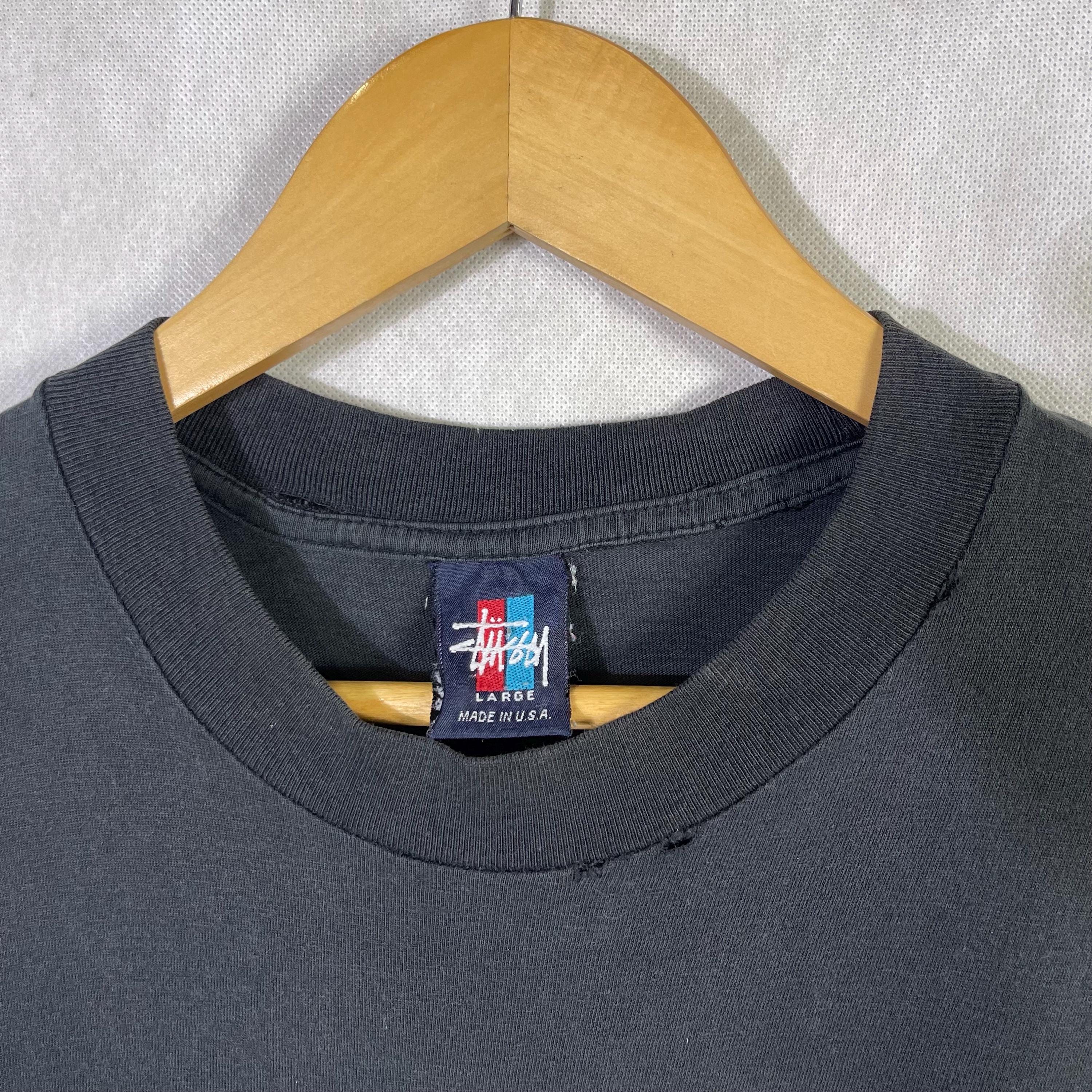 トップス 90s OLD STUSSY OVAL LOGO TEE Vintage 90s Stussy International Oval Logo Distressed Tshirt Large