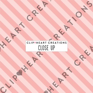 May include: Pink and white striped background with the text "Clip Heart Creations Close Up" in brown text. The text "Clip Heart Creations" is repeated in the background.