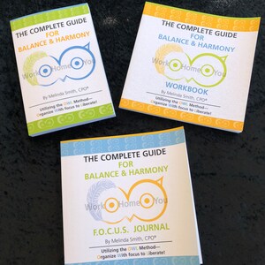 May include: Three colorful guide books with an owl logo and the text "Work Home You" on the cover. The books are titled "The Complete Guide for Balance & Harmony" and include a workbook and a journal.
