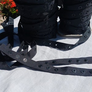 Black Snap Tape Durable Black Plastic snaps on a 3/4&quot; Ribbon 3 snaps together with 1 1/4&quot; gap between snap sets sold by the yard