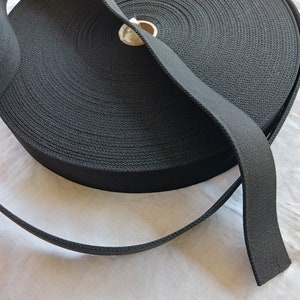 1 1/2&quot; Black elastic made for sewing on top of garments Sold by the Yard Thick Durable for elastic waist garments