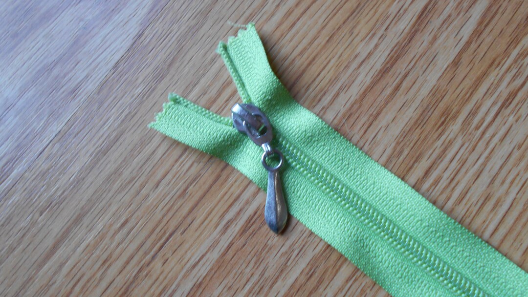 12 Inch Plastic Coil Zipper With Metal Swing Pull Lime Green Tape Good
