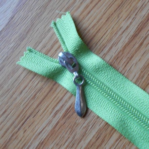 12 inch Plastic Coil zipper with Metal Swing pull lime green tape Good for all kinds of sewing projects and repairs Great Quality