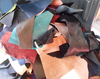 Assorted small leather scraps from up-cycled Leather perfect for leather jewelry and accents Sold by the pound.