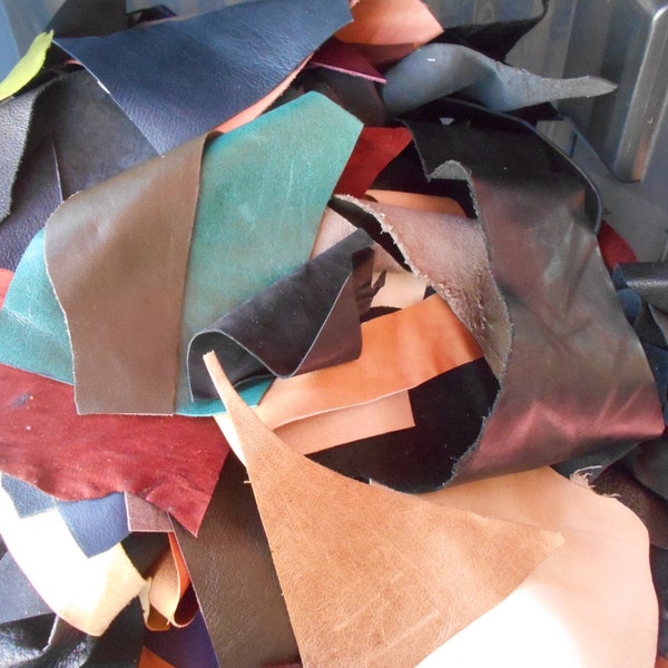 Assorted small leather scraps from up-cycled Leather perfect for leather jewelry and accents Sold by the pound.