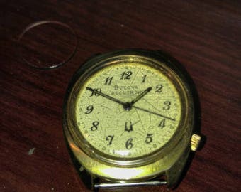 bulova accutron with day date vintage wrist watch yellow etsy