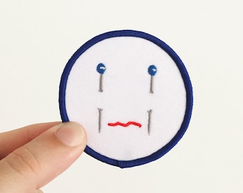 Pin Face Patch – White Blue and Red Iron-On Patch