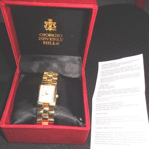 Giorgio Beverly Hills Womens Tank Watch Gold Tone Rectangle New Battery 7.25\