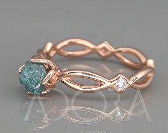 Handmade Raw Uncut Blue Diamond Celtic Engagement Ring | 14k rose gold engagement ring set with rough blue diamond and tiny natural diamonds