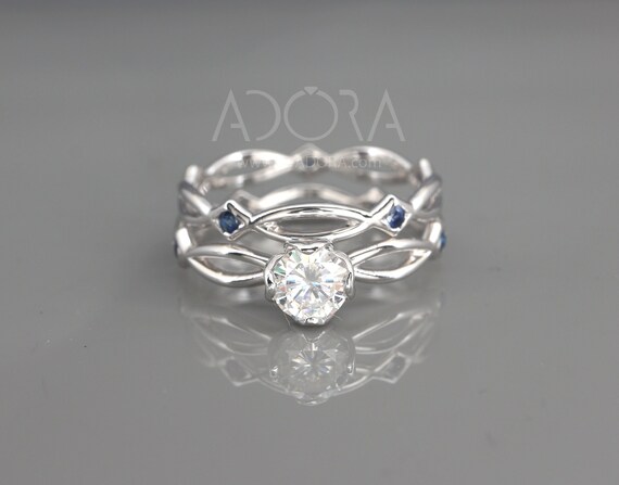 Conjunto de anillos nupciales celtas de zafiro azul hecho a mano