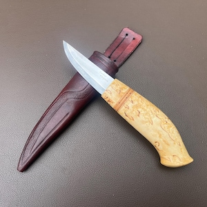 Stainless puukko knife hand made with sculpted handle from curly birch and birch bark for wood carving and the outdoors