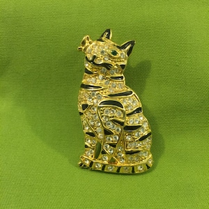 Vintage Cat goldtone brooch pin with crystals and  black enamel accents