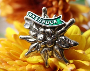 Vintage Innsbruck Edelweiss brooch pin, Austrian travel silvertone and green enamel hat pin