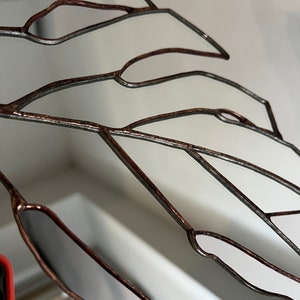 Artistic stained glass mirror leaf with organic shape