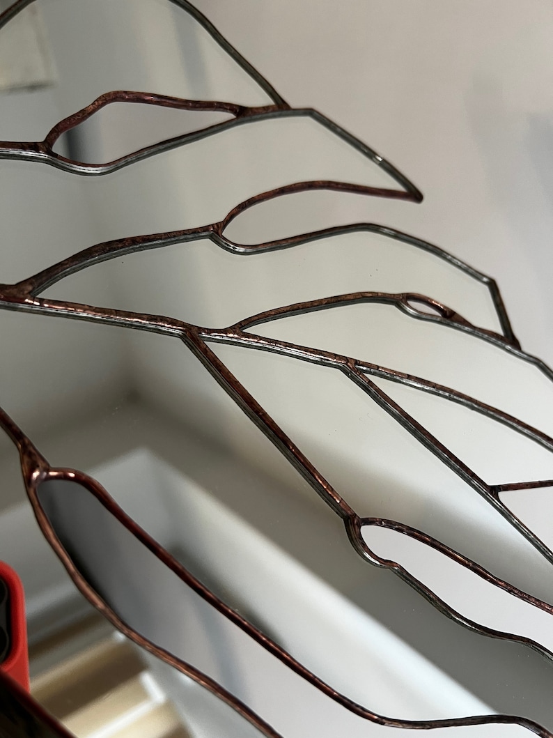 Artistic stained glass mirror leaf with organic shape