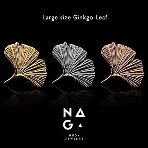 May include: Three Ginkgo leaf body jewelry pieces in gold, silver, and rose gold, displayed against a black background. The text "Large size Ginkgo Leaf" is at the top. The brand logo "NAGA BODY JEWELRY" is at the bottom.