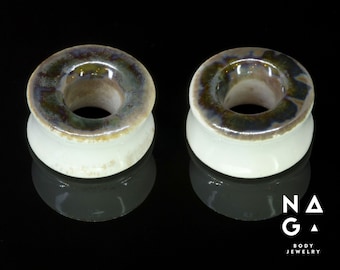 1 pair of 30mm (1.3/16'') CERAMIC ear stretchers, glass ear plugs, unique gauges