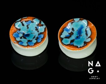 1 pair of 36mm (1.7/16") CERAMIC ear stretchers, glass ear plugs, unique gauges