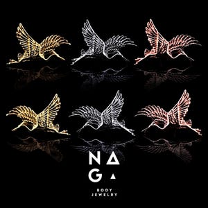 May include: Six body jewelry pieces featuring a bird design in gold, silver, and rose gold colors. The birds are depicted in flight against a black background. The brand name "NAGA BODY JEWELRY" is displayed below the birds.