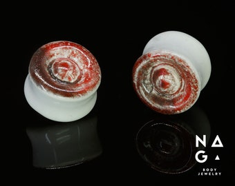1 pair of 22mm (7/8") CERAMIC ear stretchers, glass ear plugs, unique gauges