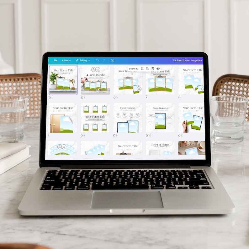 May include: A laptop screen showing a product image pack with form templates. The screen displays designs with the text "Your Form Title" and "The Form Product Image Pack". The laptop is on a white surface.