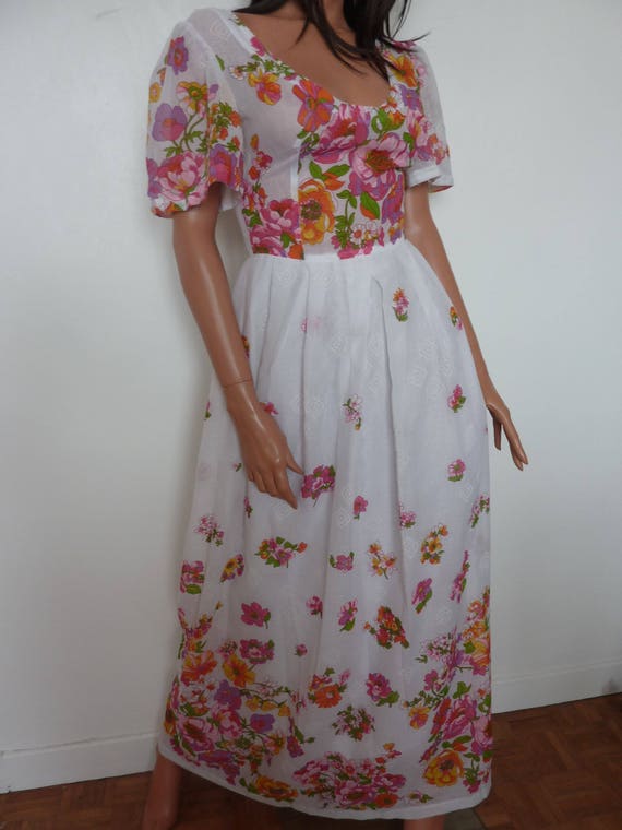 pink floaty dress with sleeves