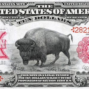 May include: A vintage ten dollar bill from the United States, featuring a red seal and a black and white image of a buffalo. The bill has the text "UNITED STATES OF AMERICA" and "TEN DOLLARS" printed on it. The serial number is "28219991".