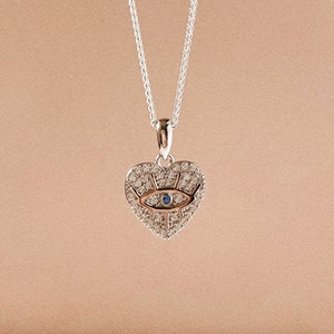 Heart Shaped Evil Eye Pendant. Sterling Silver Necklace.