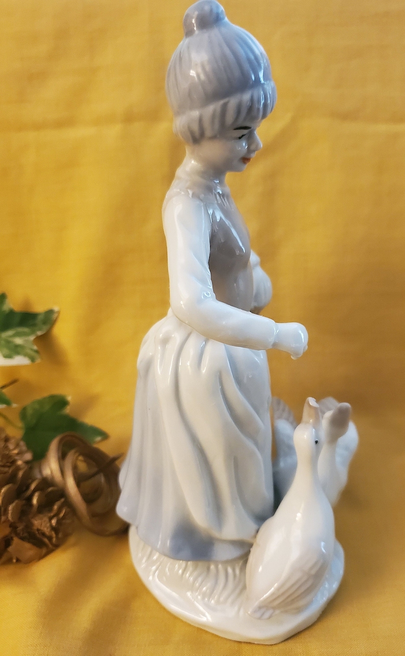 Vintage Handpainted Ceramic Figurine Girl With Basket Feeding Ducks Unbranded 8 Inches Tall 1970s