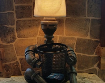 Hancrafted Industrial Pipe steampunk style Sitting Man lamp