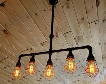 Handcrafted Industrial Pipe 5 bulb Ceiling light with cages