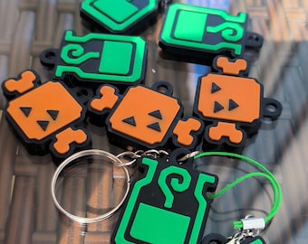 Monster hunter icons potion and meat keychain