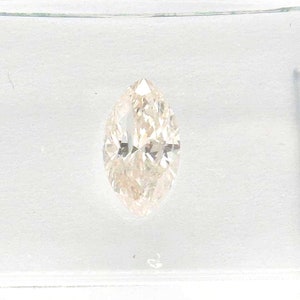 0.67ct Marquise Natural Diamond IGI certified K/I2  (faint brown)