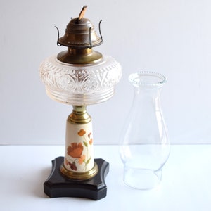 Oil Lamp with White eagle on Chimney signed Karen Streamer