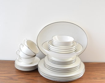 30-piece Noritake Montblanc 7527 Dinnerware with Silver Trim 4 Place setting Table