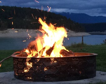 Sculptured fire pit and fire ring