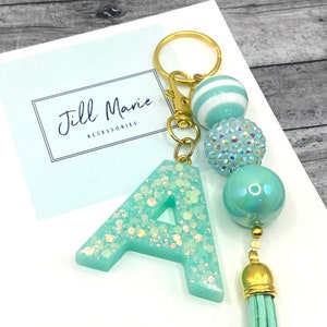 Mint bubblegum beaded keychain with custom resin initial.