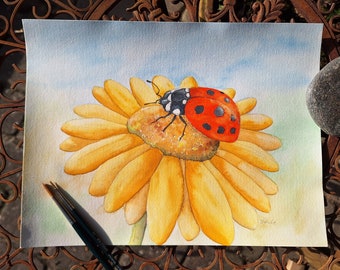 Ladybug on yellow flower