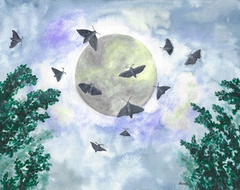 Moths in front of the Moon